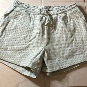 ONLY light teal lined shorts with pockets.  EUC!